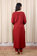 Back look of maroon long sleeves kurta for women
